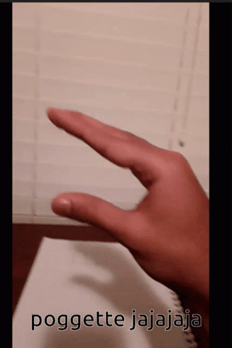 hand showing symbol of finger touching on paper