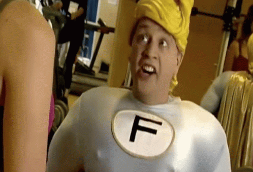 a man is wearing a costume with an f in it