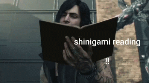 a woman reading a book that says, shinigami reading