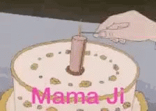 a small birthday cake on a plate that says mama ji