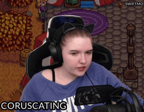 a girl with a microphone talking into a video game