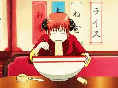 anime with headphones sitting in a bowl