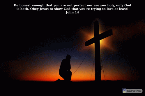 a silhouette of the person kneeling down at the cross with a bright blue cross behind them