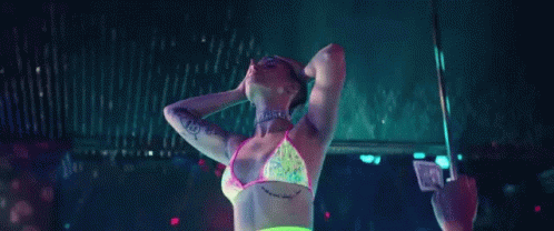a woman with a bright underwear on performing