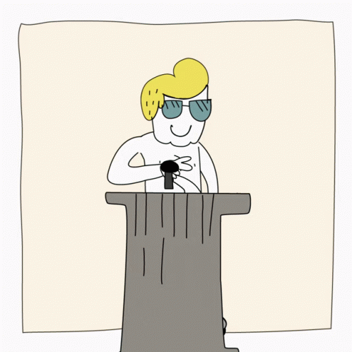 an image of a person standing at a podium speaking