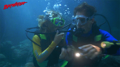 there are two scuba enthusiasts taking a selfie