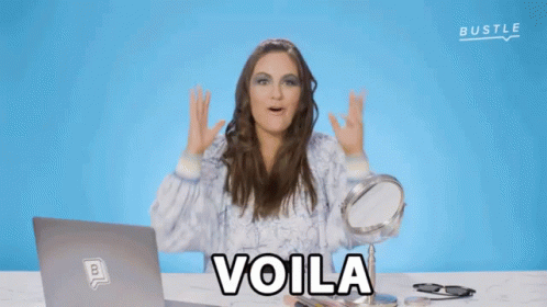 a person that is on her computer with the words volia above them