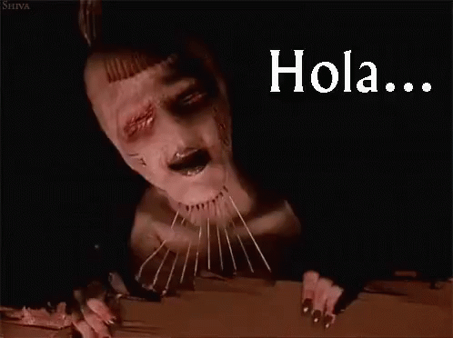 a strange looking white zombie with text hola
