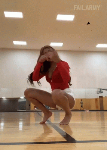 an image of a girl doing dance moves in the gym