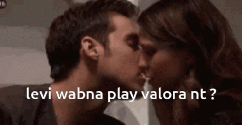a woman kissing her husband with the words levi wahn play valora
