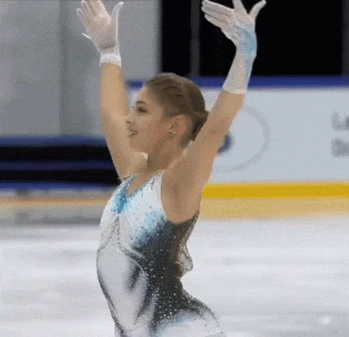 a person in an olympic skating outfit