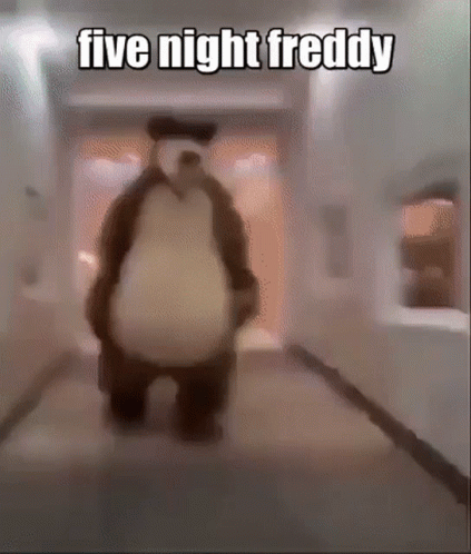 the panda is walking down the hallway in a funny position