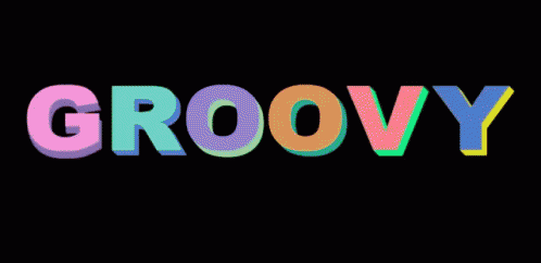 the word groohy spelled in multi - colored type