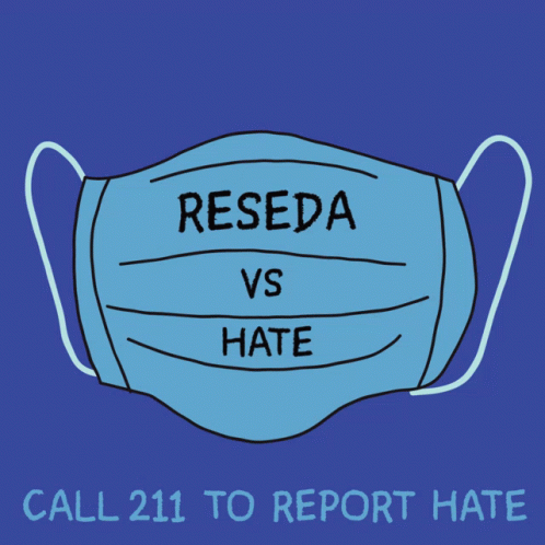 a face mask with the words reseda versus hate