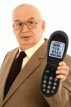 a man is holding up a flip phone and it says 300 + minutes