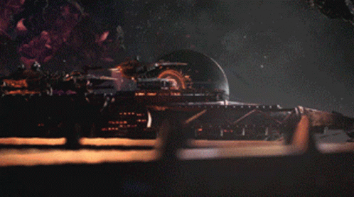 a sci - fi movie scene shows an alien ship and space shuttle