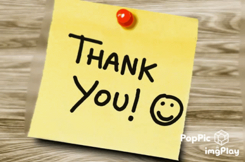 a sticky note saying thank you with a blue post - it notes attached to it