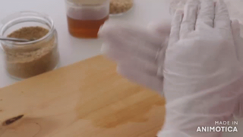 gloves on table with powder in front of them