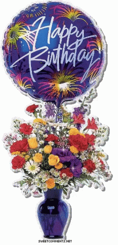 a vase filled with flowers and balloons