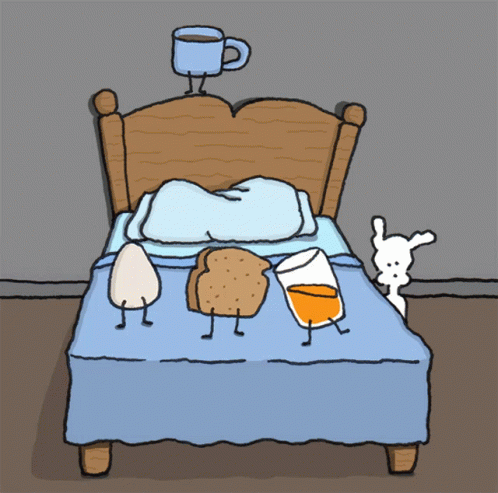 a person lying in bed with two cups on their laps