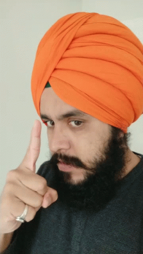 a man is dressed as a man with a turban