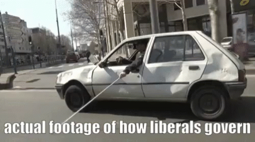 a white car with the words actual footage of how liberars government