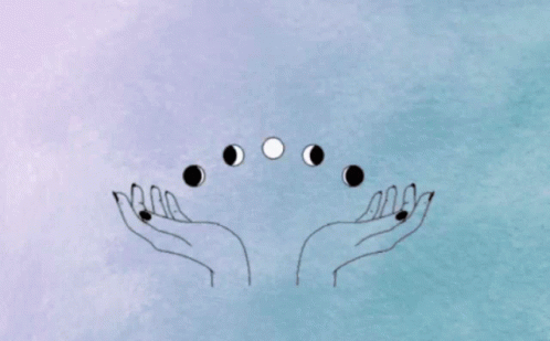 an artistic view of two hands holding different circles