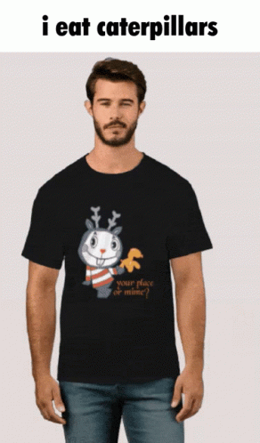 a man wearing a funny t - shirt with a reindeer on it