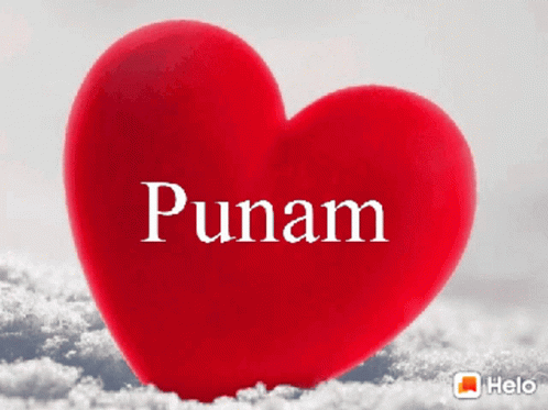 a heart - shaped balloon sitting in snow saying punam
