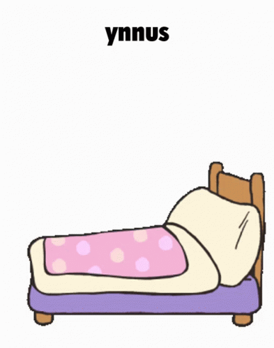 a bed with pink and blue polka dots on it