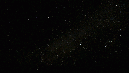 a star field that is dark and starry with only some light stars visible