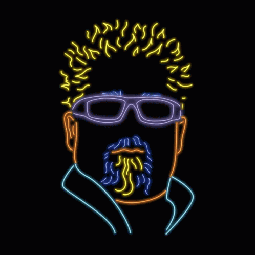 a neon lit image of a man's face with a beard