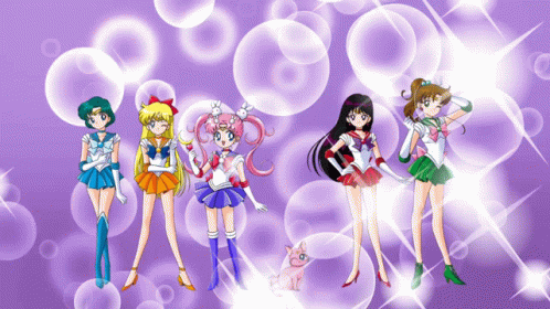 six girls are holding different colored items
