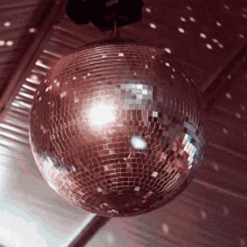 a mirror ball hanging from a ceiling