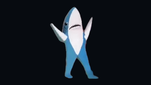 a picture of a white shark character wearing tan pants