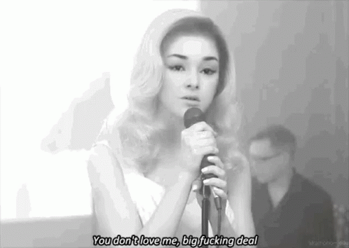 black and white po of lady with microphone with quote