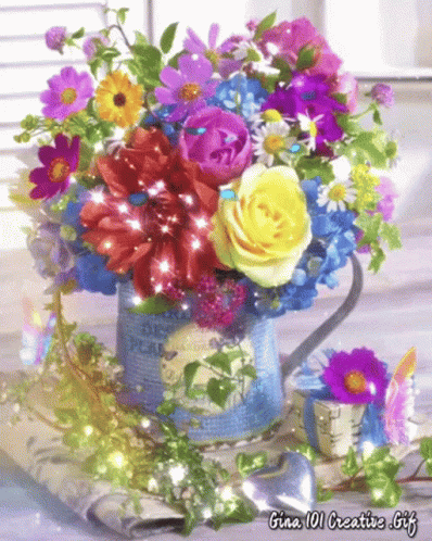 a floral bouquet with blue flowers on display
