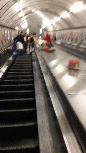 this is an escalator with people riding it