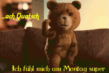 a stuffed teddy bear holding his arm up