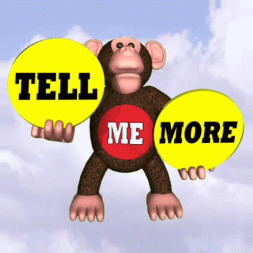 the monkey is holding two blue round speech bubbles