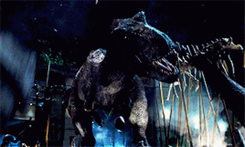 a large dinosaur is standing in the middle of a stage