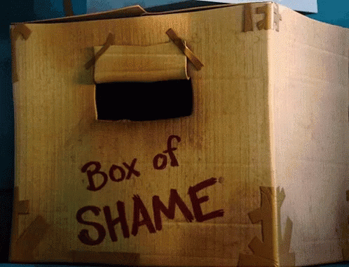 a box that has the word shame on it