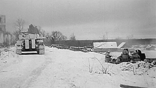 black and white pograph of army vehicles in snow