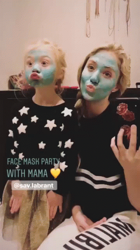 two girls in matching body paint and face paint