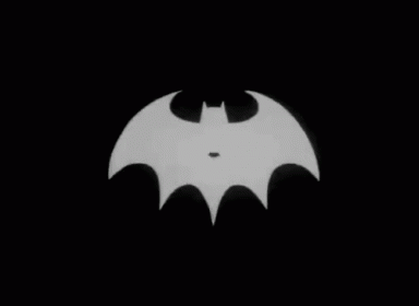 a black and white image with a batman symbol