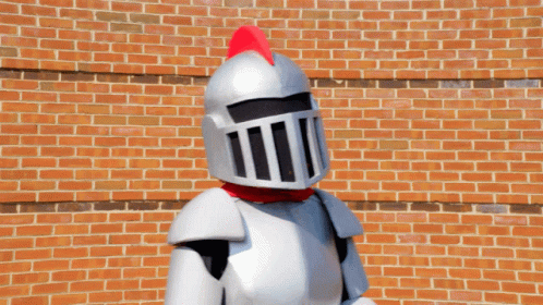 this robot costume is standing on a blue brick