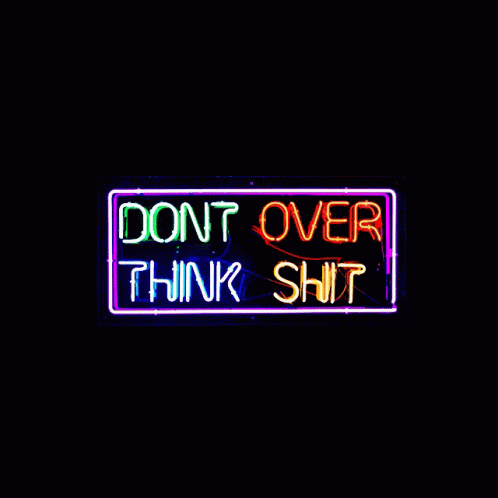 a neon sign with the words don't over think 