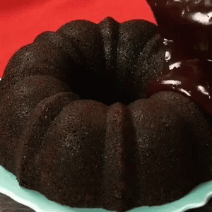 the bundt cake has black icing on it