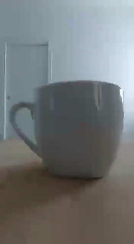 a mug sits on the floor of the room