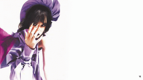 an illustration of a woman with blue skin and a purple dress with black hair
